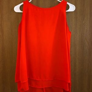 Orange sleeveless blouse